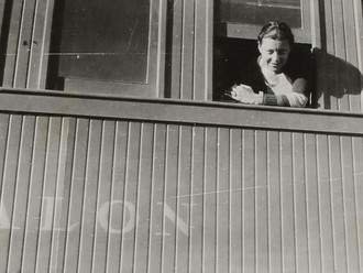 Erna Pinner looking out of a train window